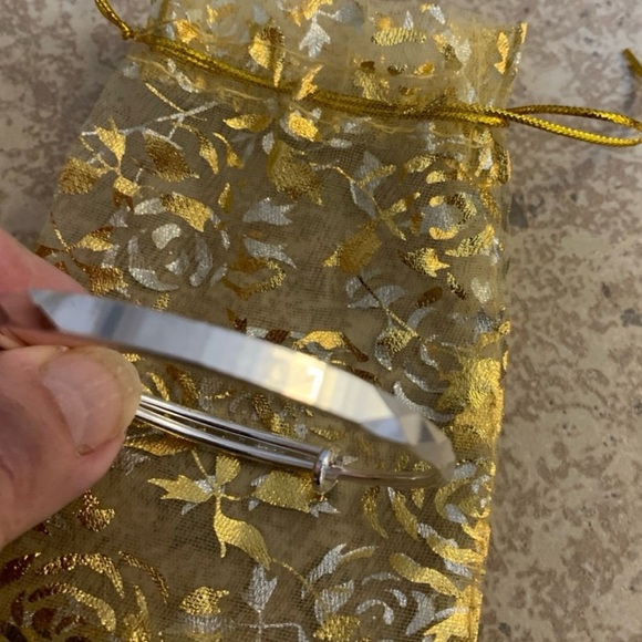 New! Silver-Toned adjustable bangle bracelet with the word “Lucky” engraved - Picture 2 of 5